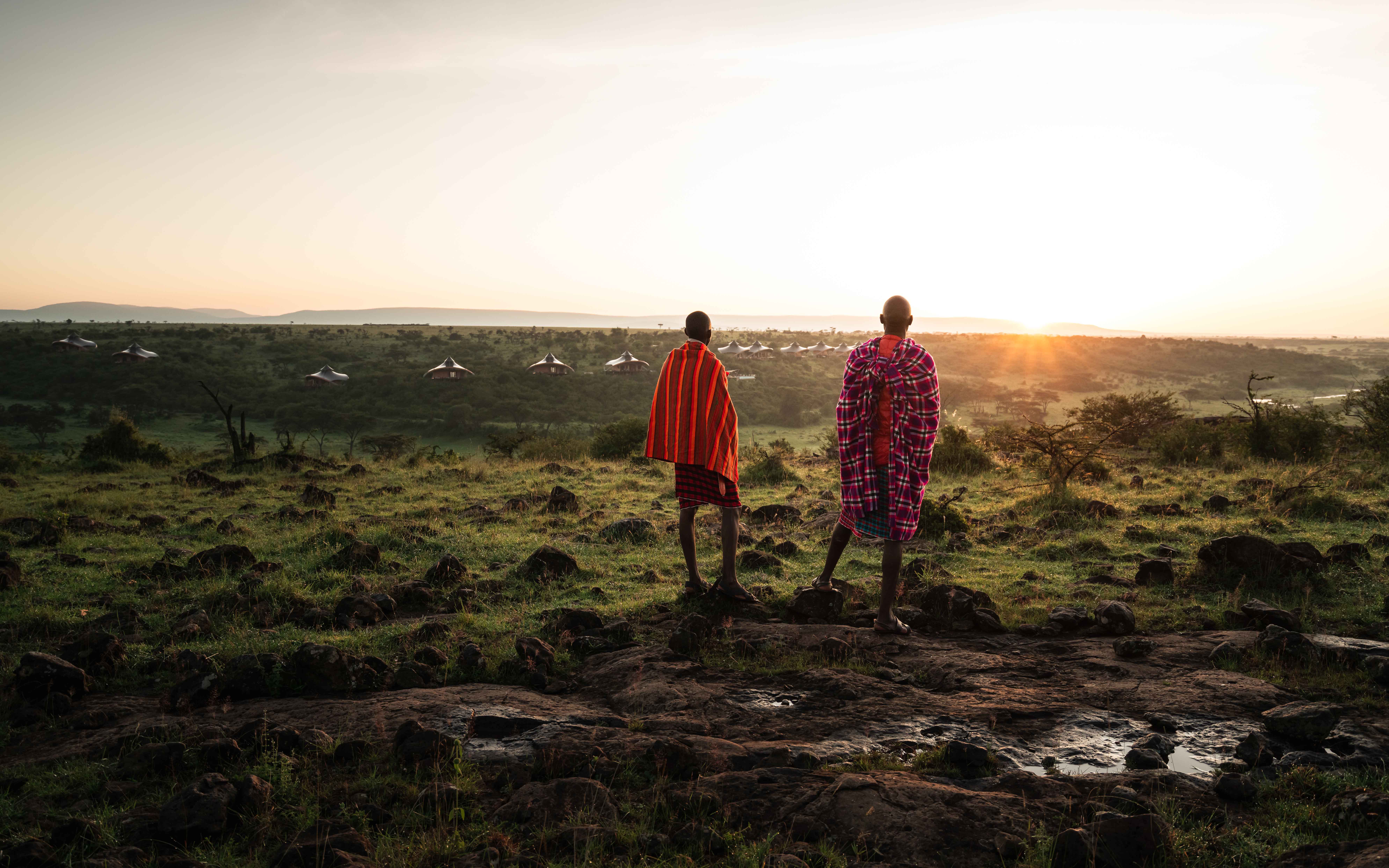 Two Maasai warriors overlooking the Mara
